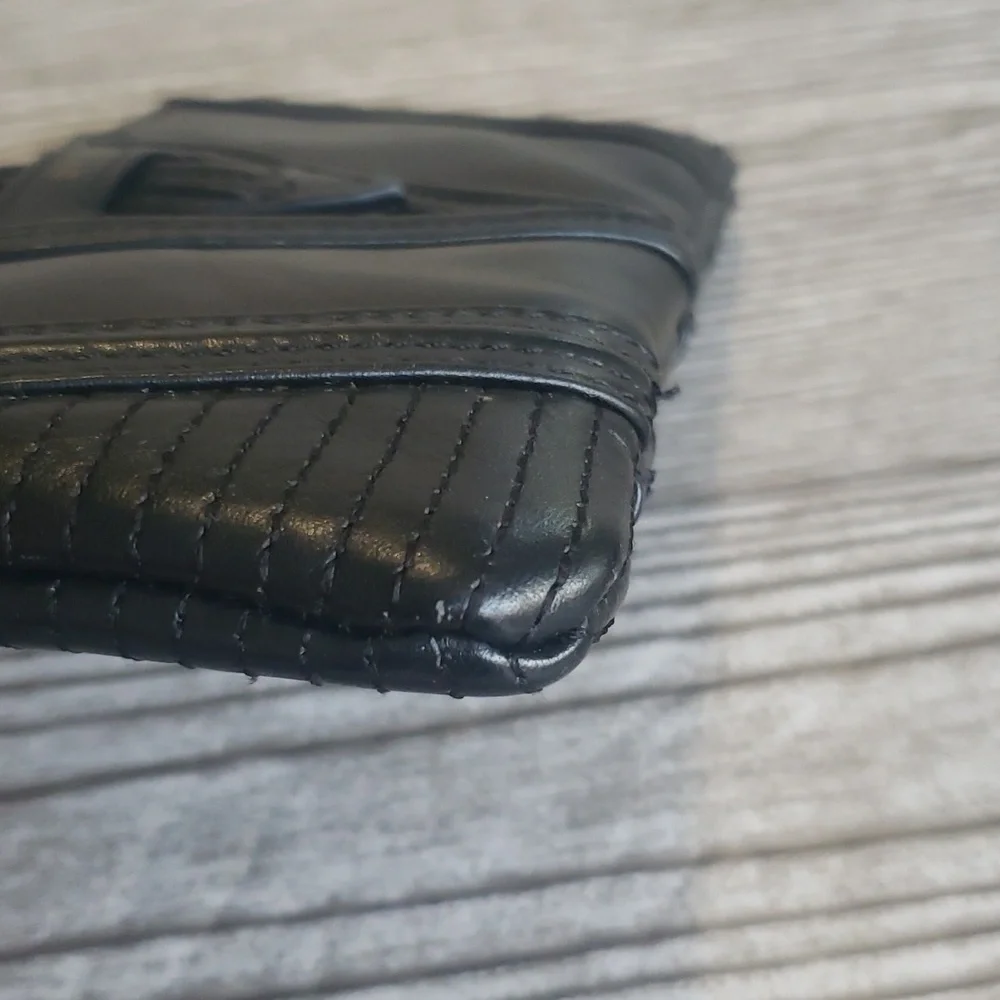 BVNDI black leather upper zip clutch